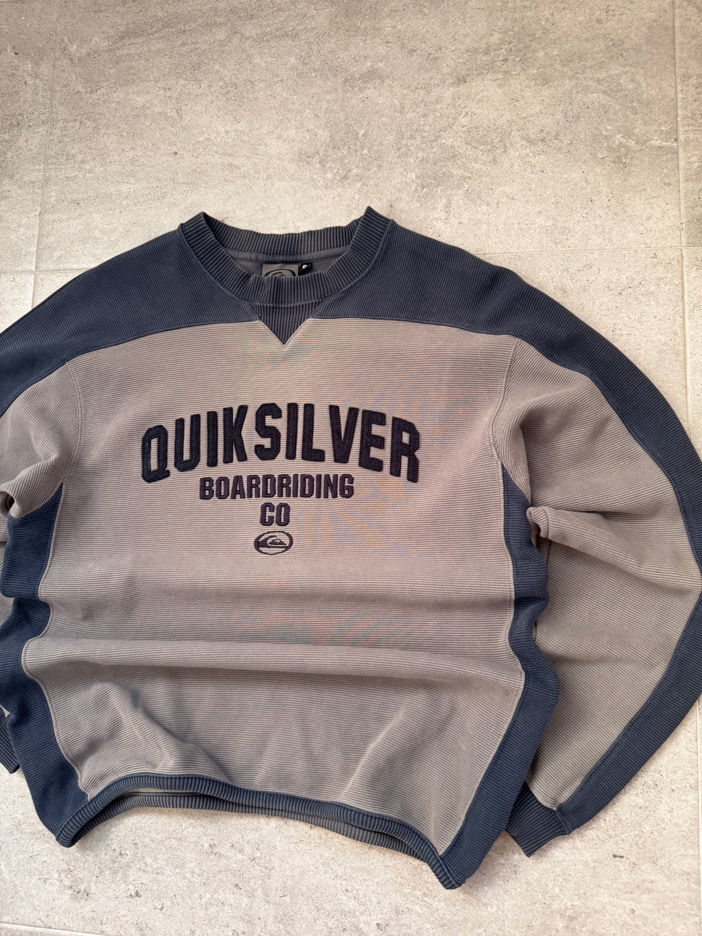 90s Quiksilver vintage sweatshirt in grey and navy, size S - back view