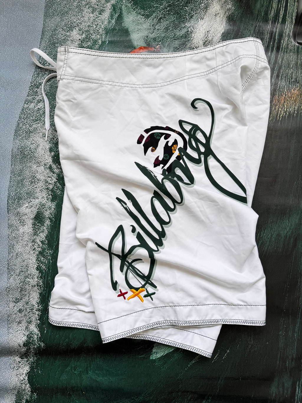 Y2K Billabong boardshorts front — authentic vintage surfwear