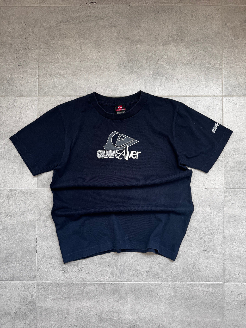 Vintage Y2K Quiksilver T-shirt in navy, front view