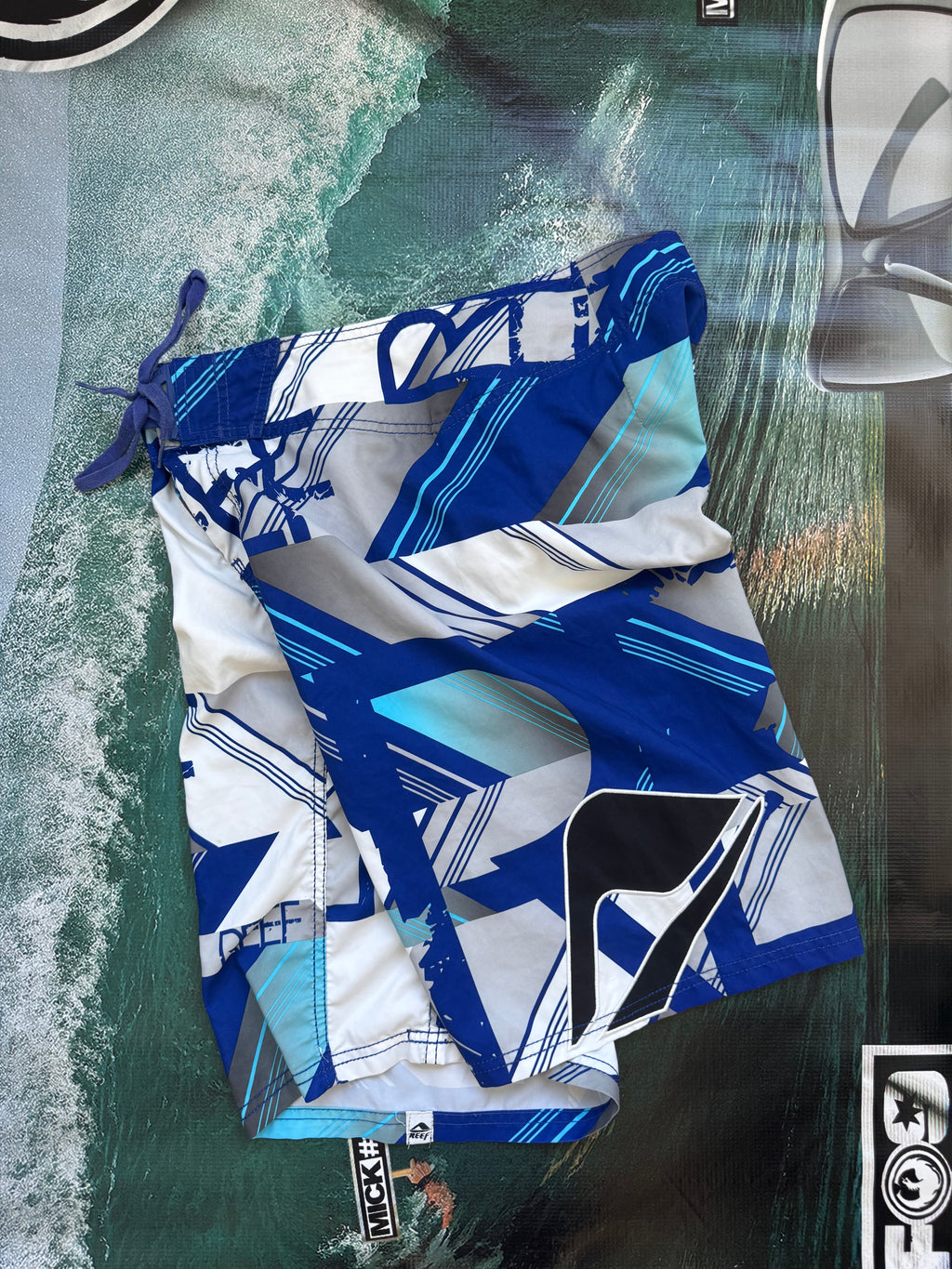 Y2K Reef boardshorts in blue, white and grey, size 32, vintage surf shorts - back view