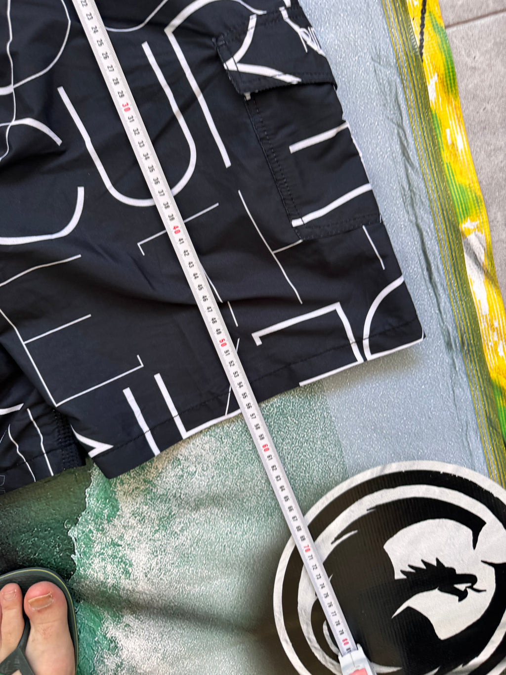 Vintage Y2K Rip Curl boardshorts, fabric close-up