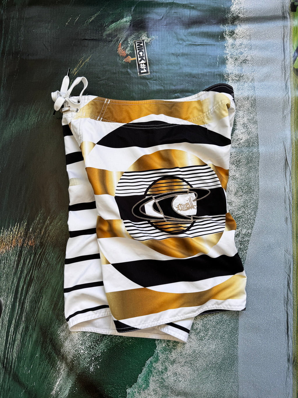 Vintage Y2K O'Neill John John Florence signature boardshorts, back view