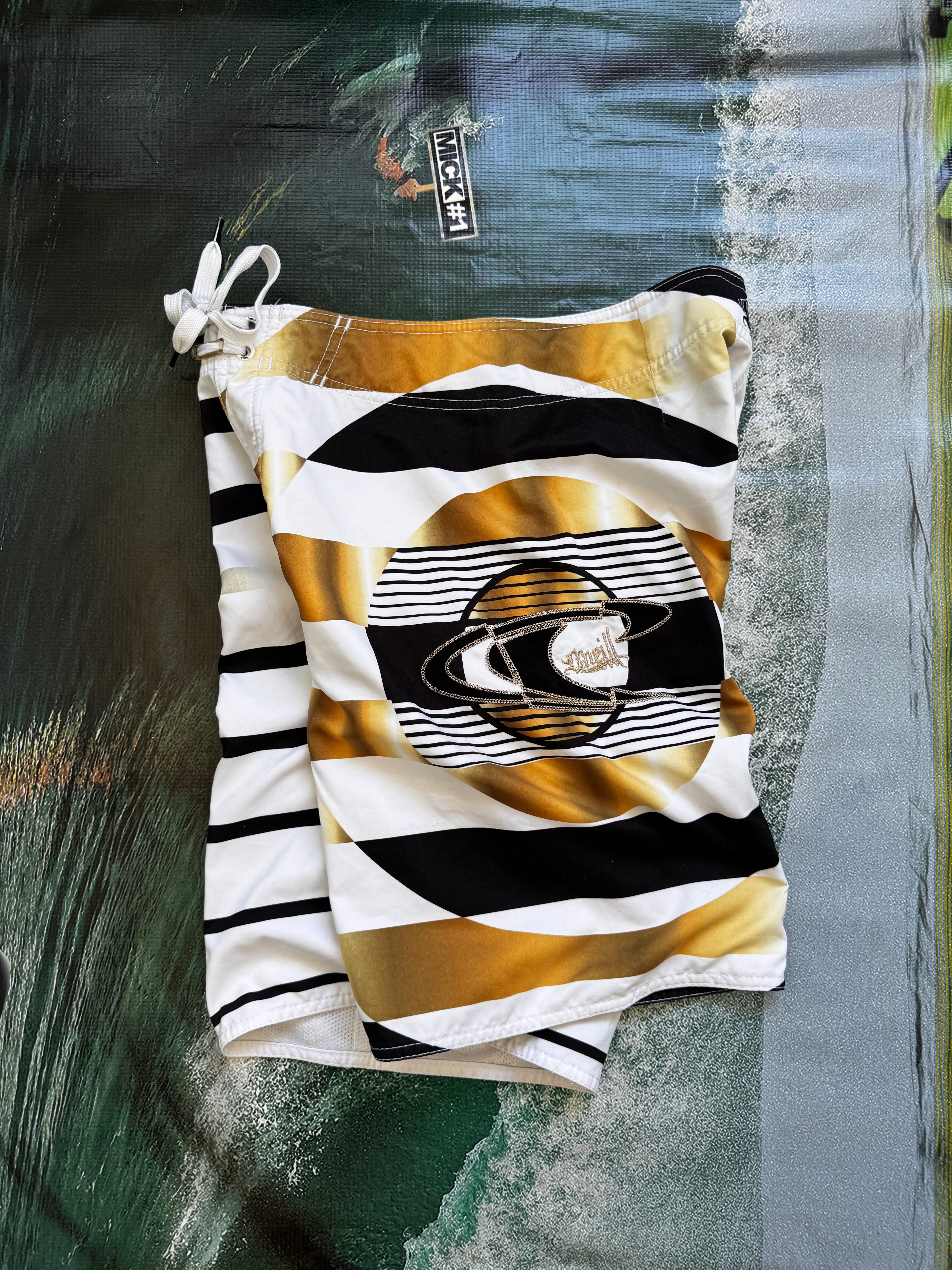 Vintage Y2K O'Neill John John Florence signature boardshorts, back view