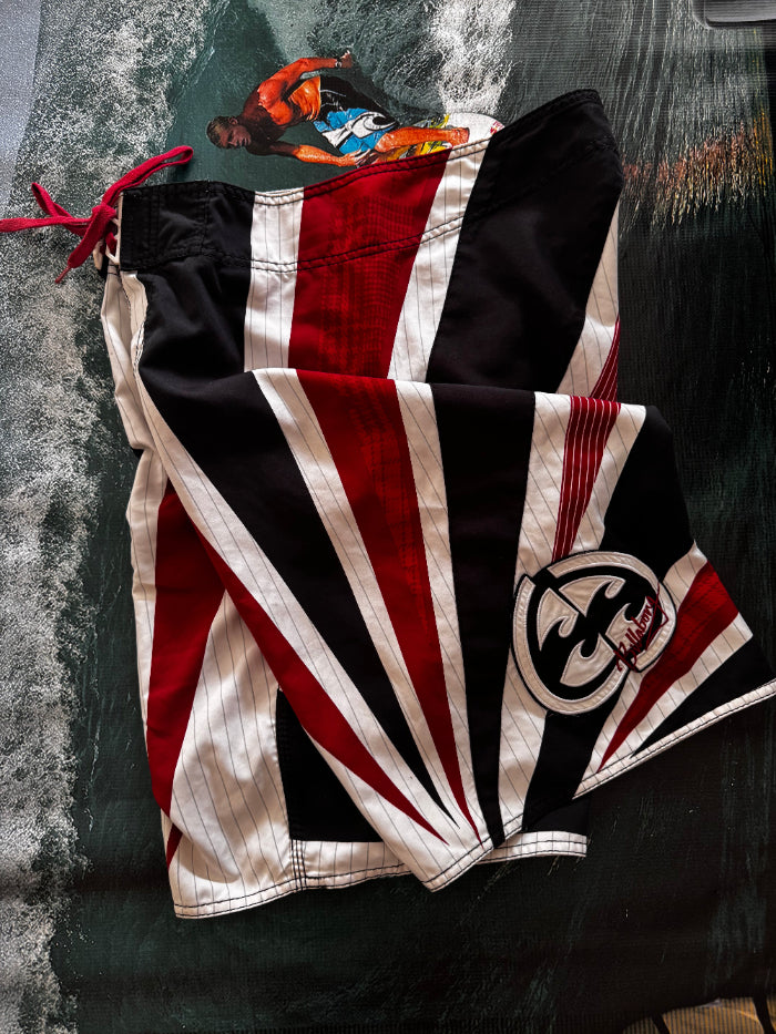 Y2K Billabong Andy Irons Samurai boardshorts front graphic — authentic vintage surfwear