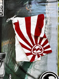 Vintage Y2K Billabong Andy Irons Rising Sun boardshorts in white and red, front view