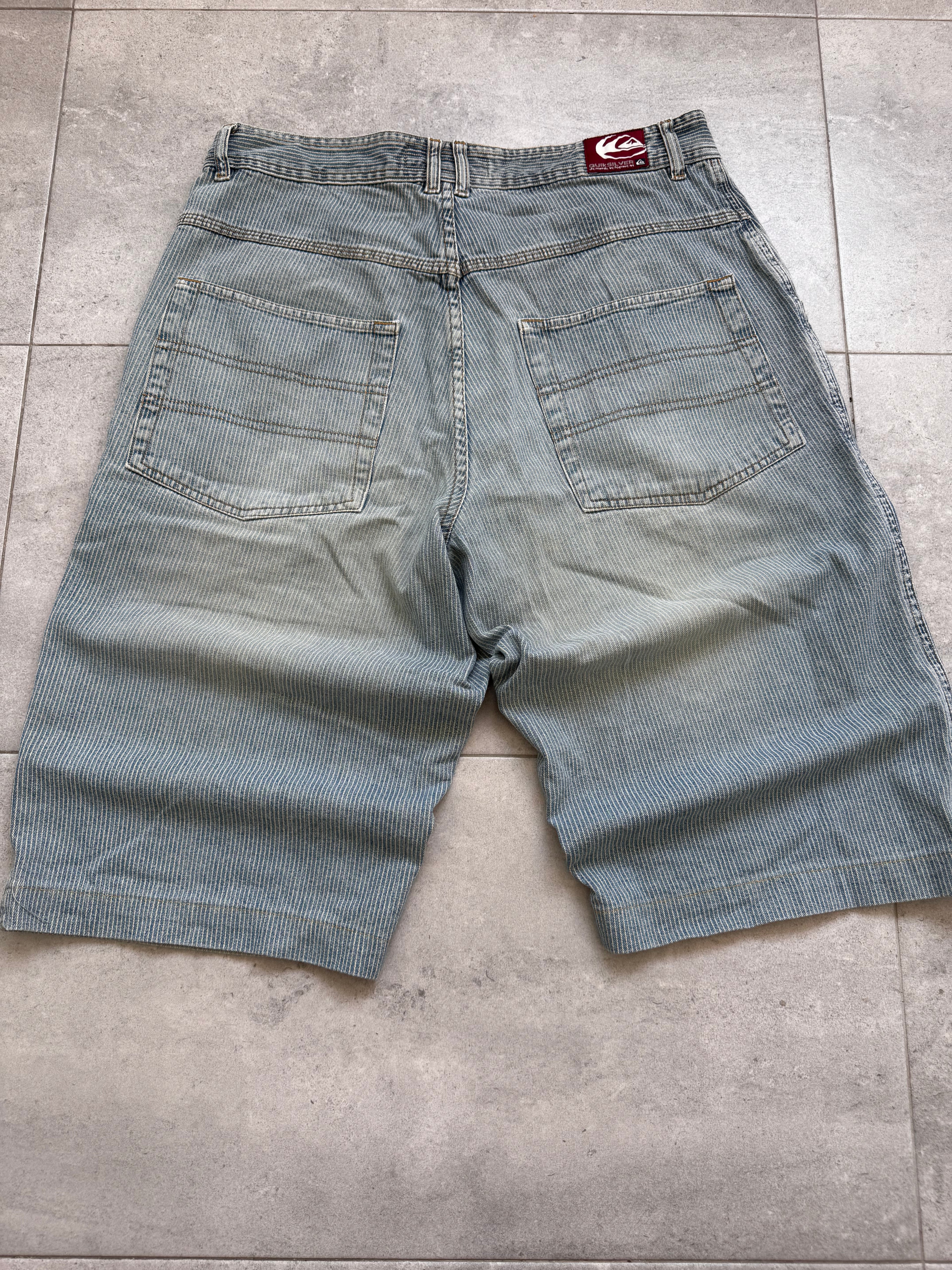 2000s Quiksilver denim shorts label — genuine vintage surfwear