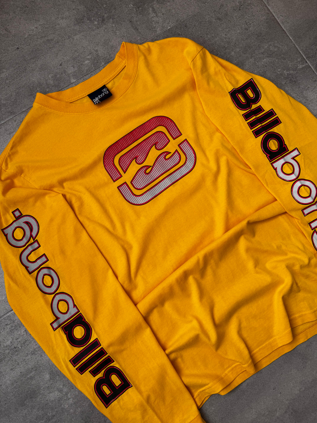 Vintage Y2K Billabong long sleeve top in yellow, front view