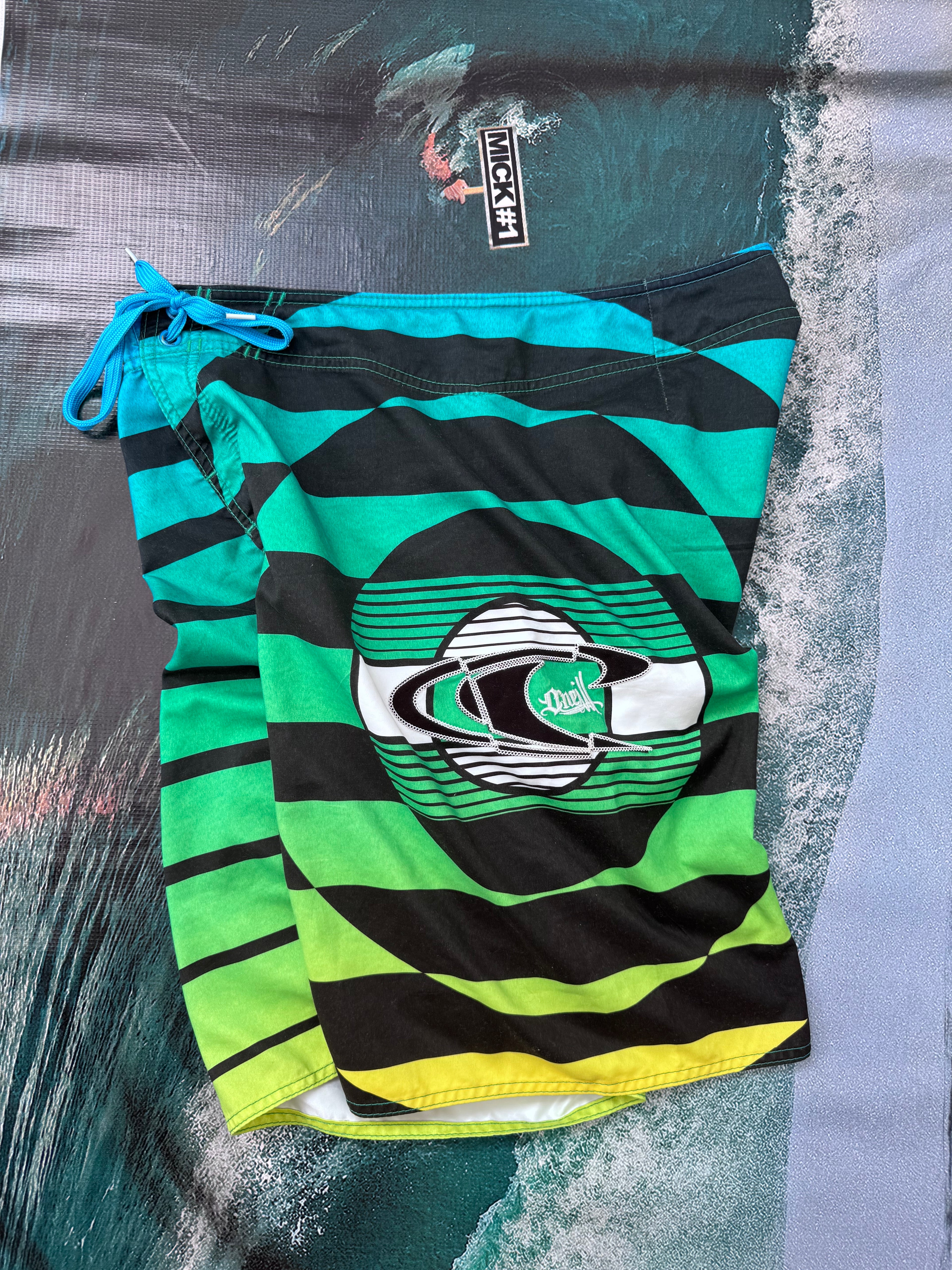 Y2K O'Neill John John Florence boardshorts blue/green/black size 33 – back view