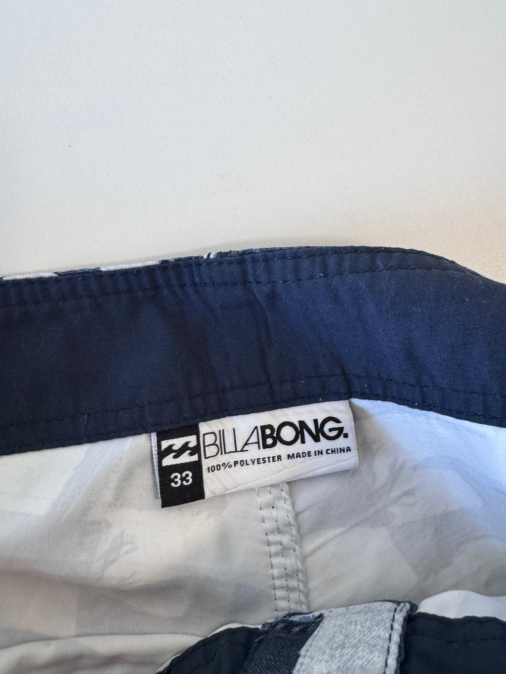 Y2K Billabong denim boardshorts in navy, size 33, deadstock surf shorts - close-up detail