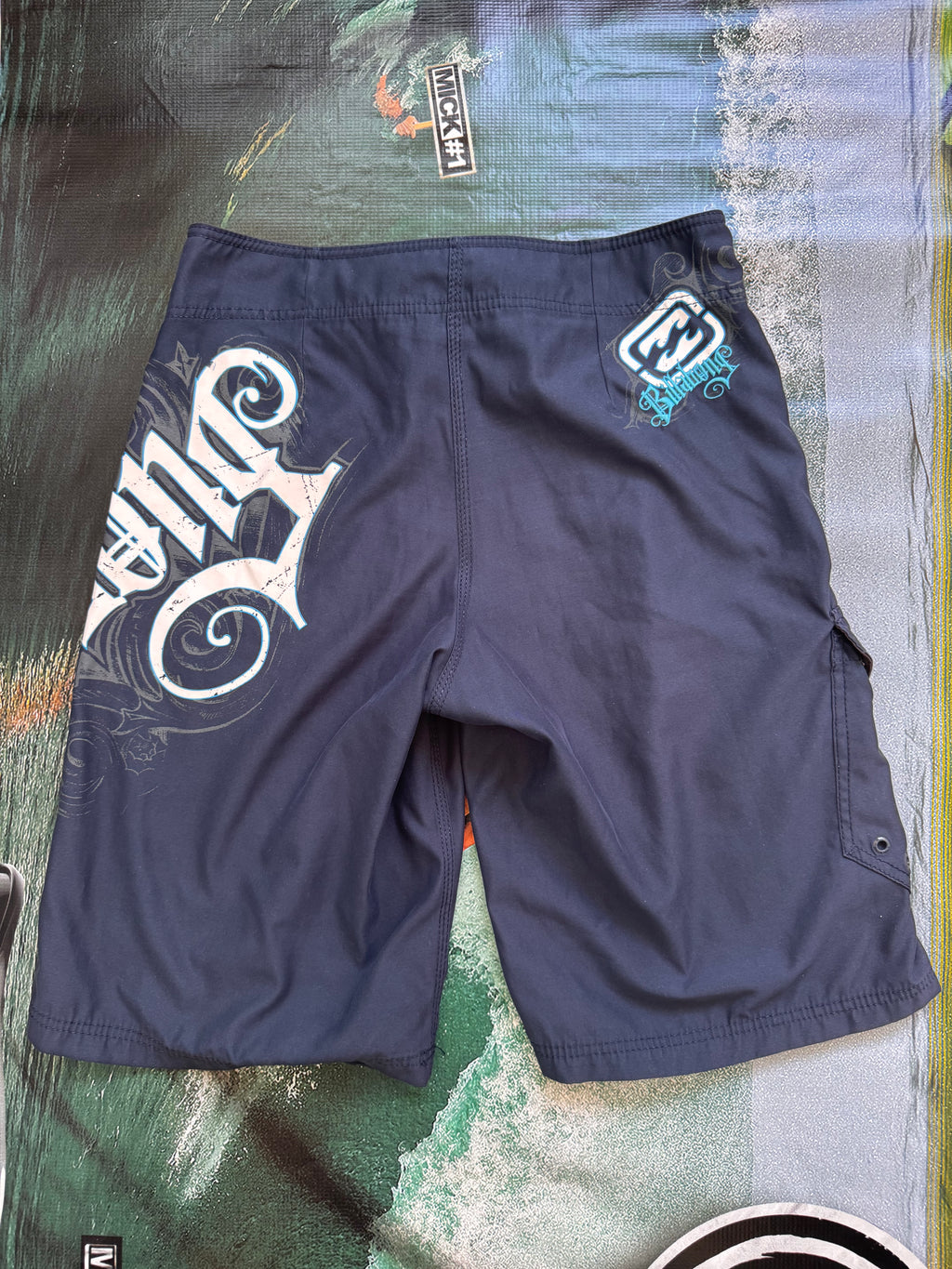 Vintage Y2K Billabong boardshorts in navy, logo detail