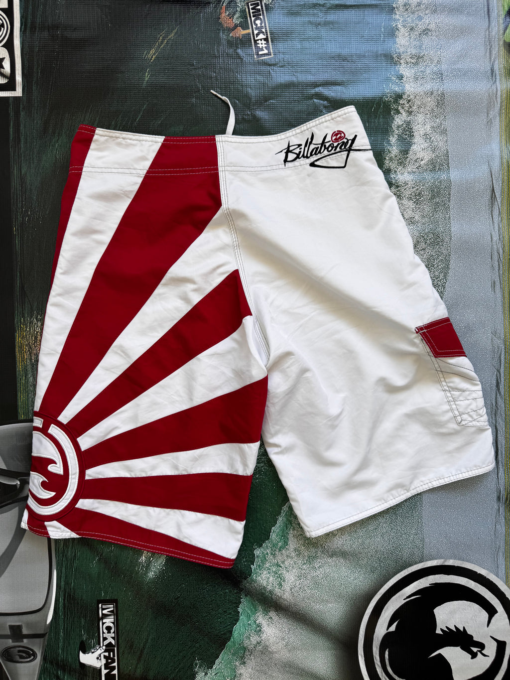 Vintage Y2K Billabong Andy Irons Rising Sun boardshorts in white and red, back view