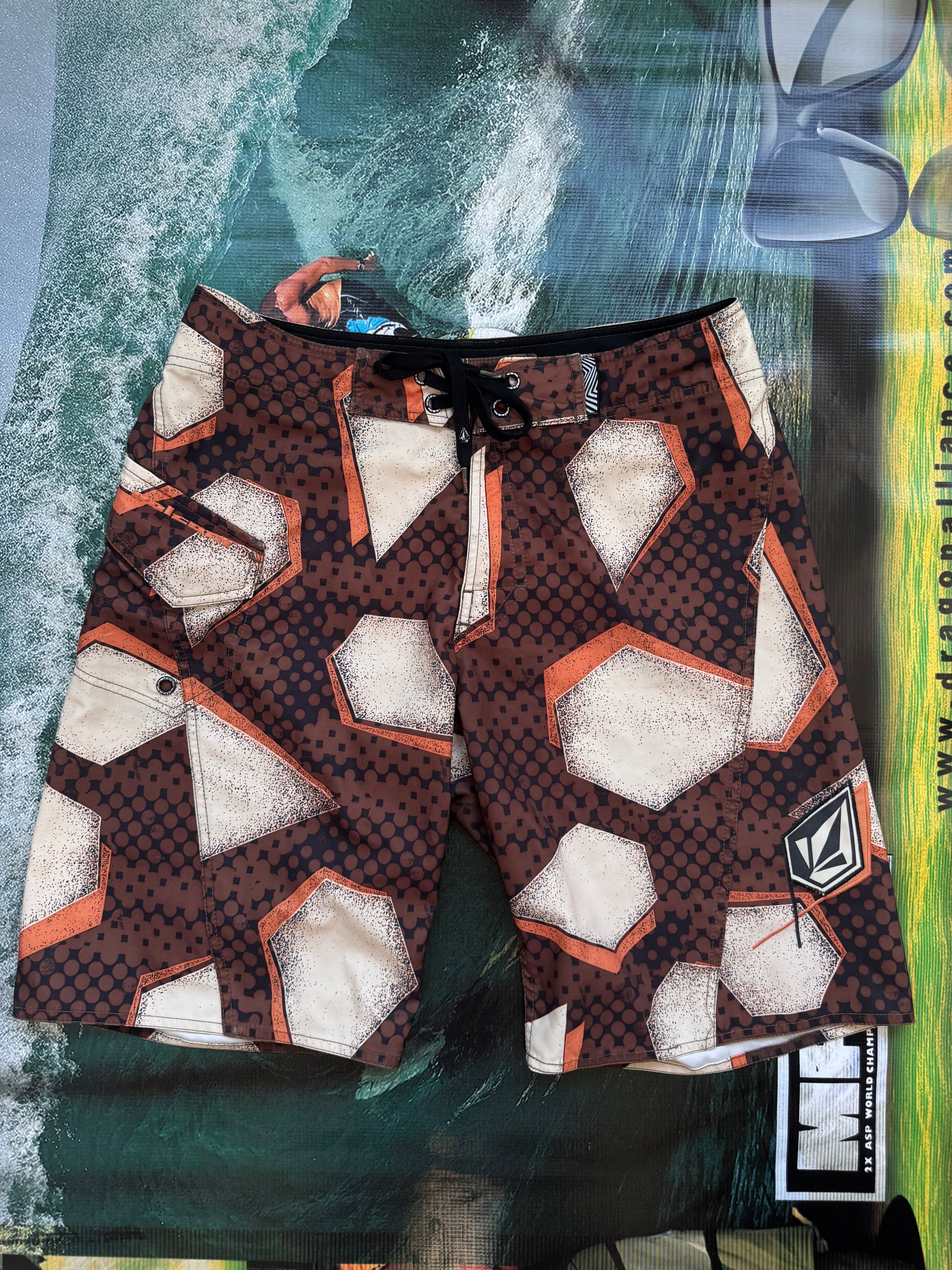 Y2K Volcom boardshorts in brown, size 32, vintage surf and skate shorts - front view