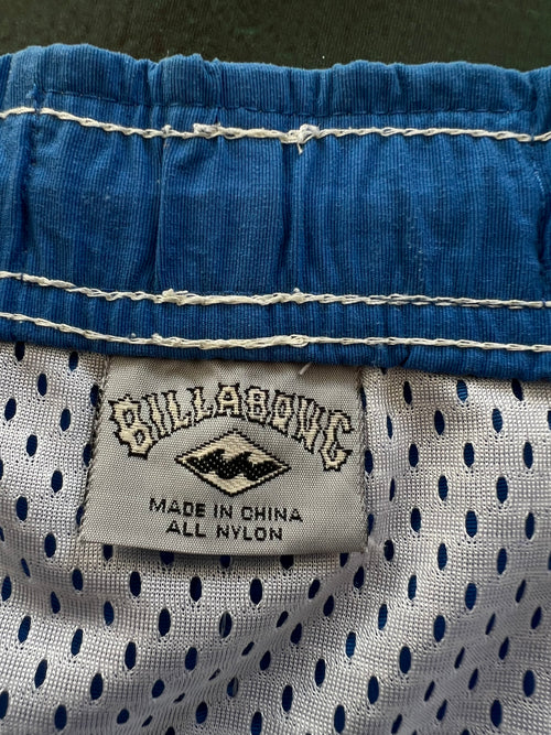 90s Billabong boardshorts front — authentic vintage surfwear 1990s