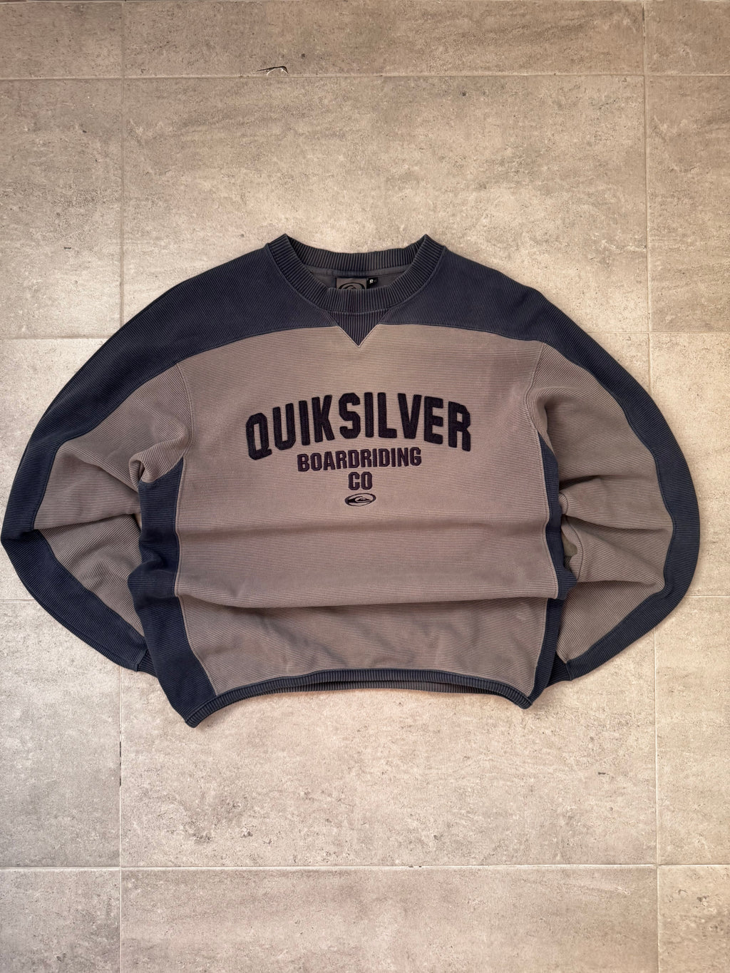 90s Quiksilver vintage sweatshirt in grey and navy, size S - front view
