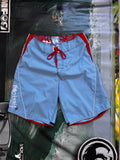 Vintage Y2K Billabong Taj Burrow signature boardshorts in blue and red, front view