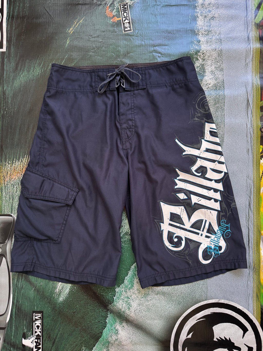 Vintage Y2K Billabong boardshorts in navy, back view