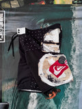 Y2K Quiksilver boardshorts black/beige/white size 14Y – front view