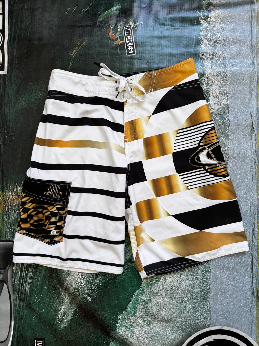 Vintage Y2K O'Neill John John Florence signature boardshorts, front view