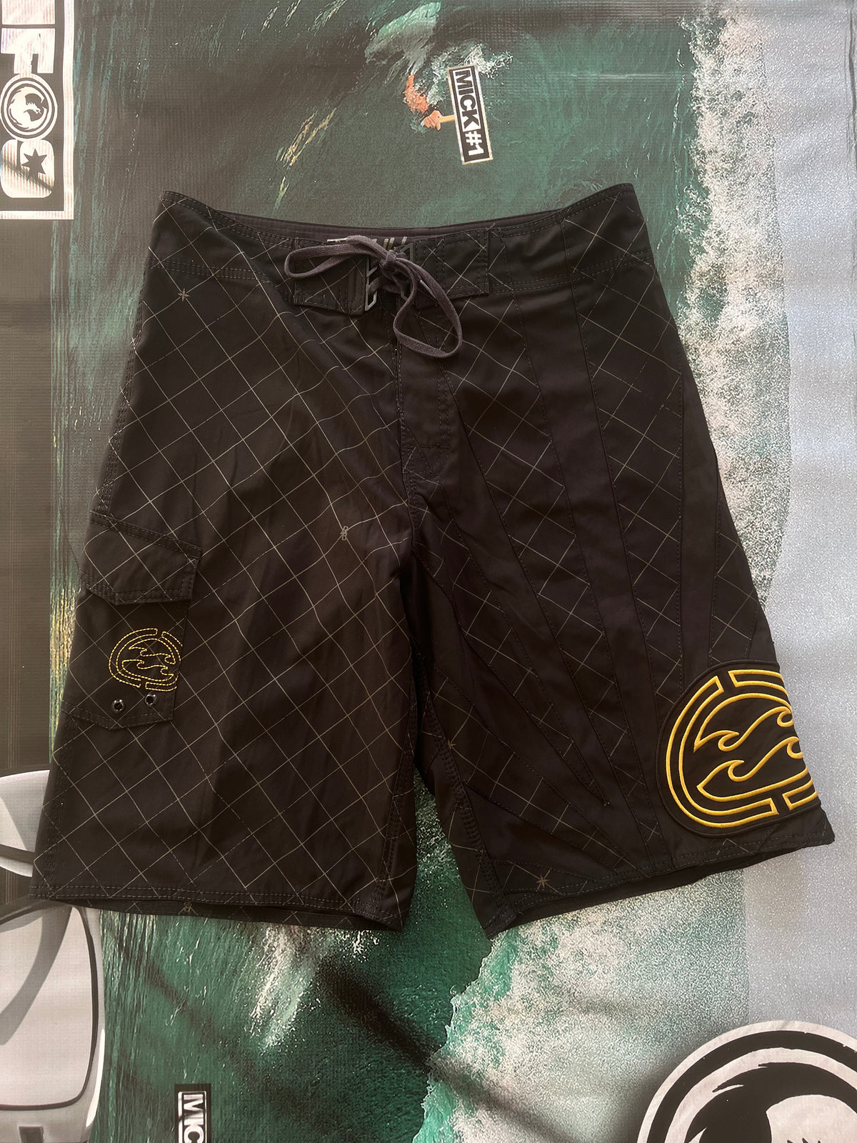 Y2K Billabong Andy Irons Rising Sun Platinum boardshorts front — authentic vintage surfwear