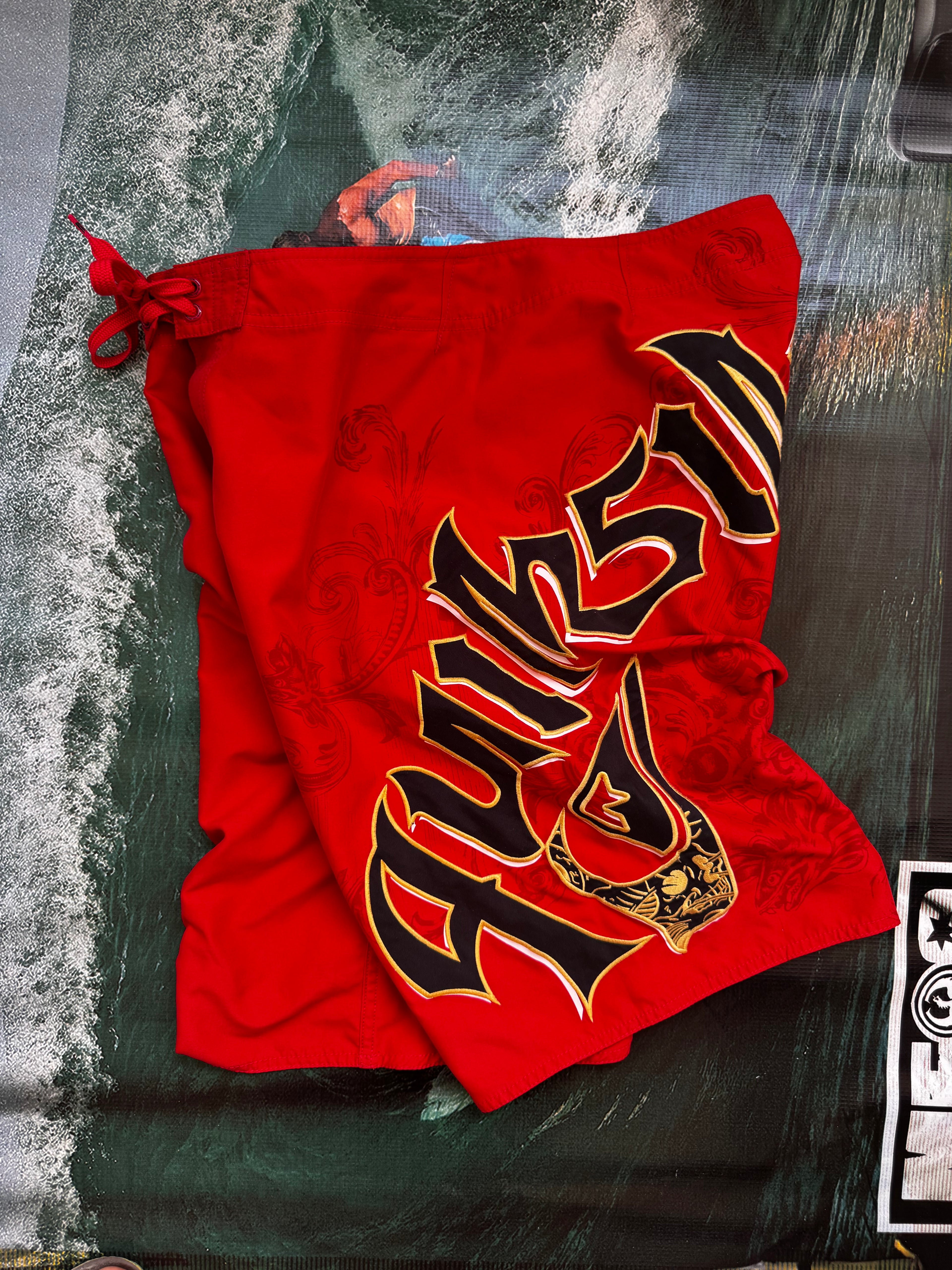 Y2K Quiksilver red boardshorts size 31