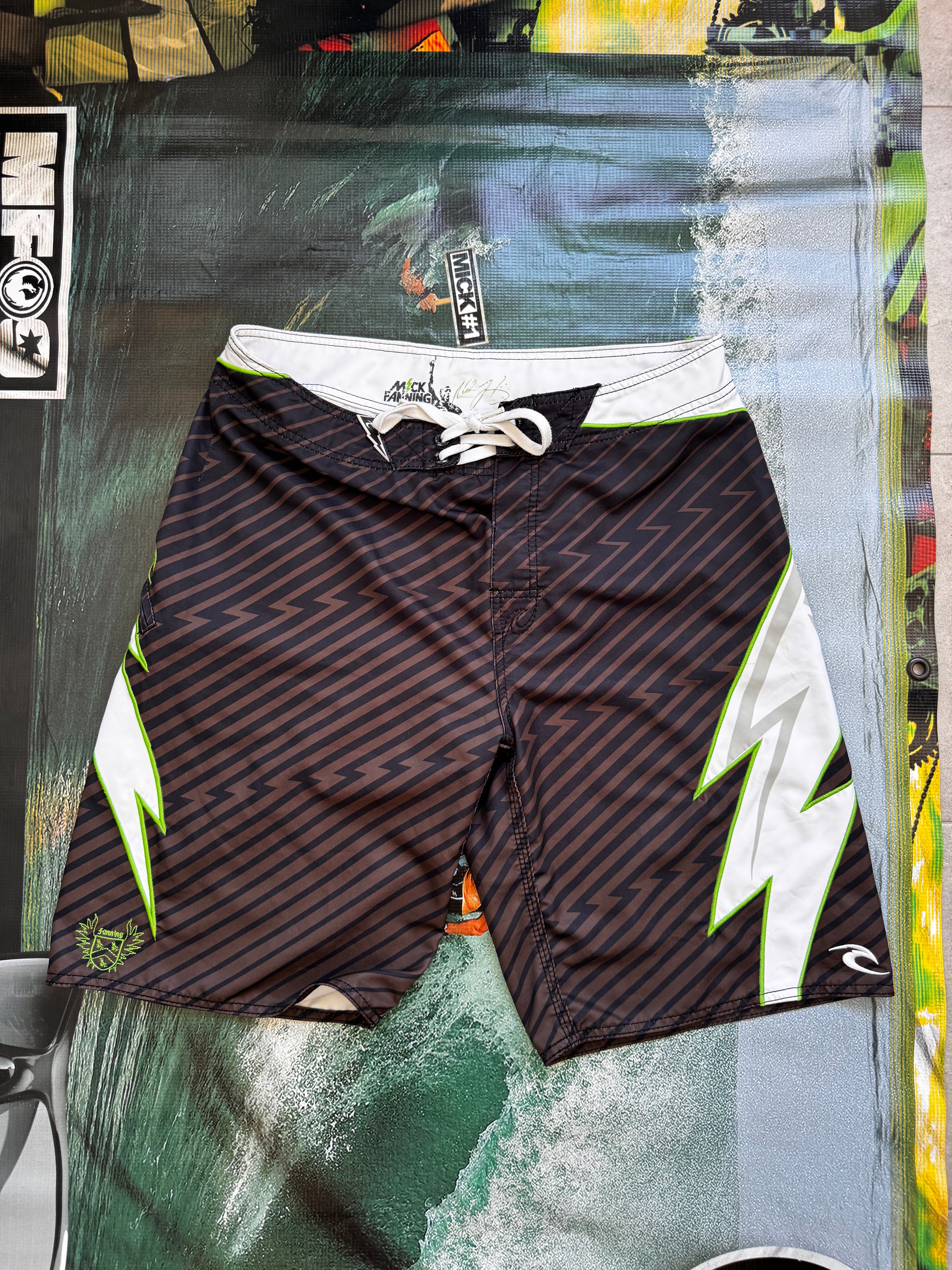 Vintage Y2K Rip Curl Mick Fanning signature boardshorts, front view