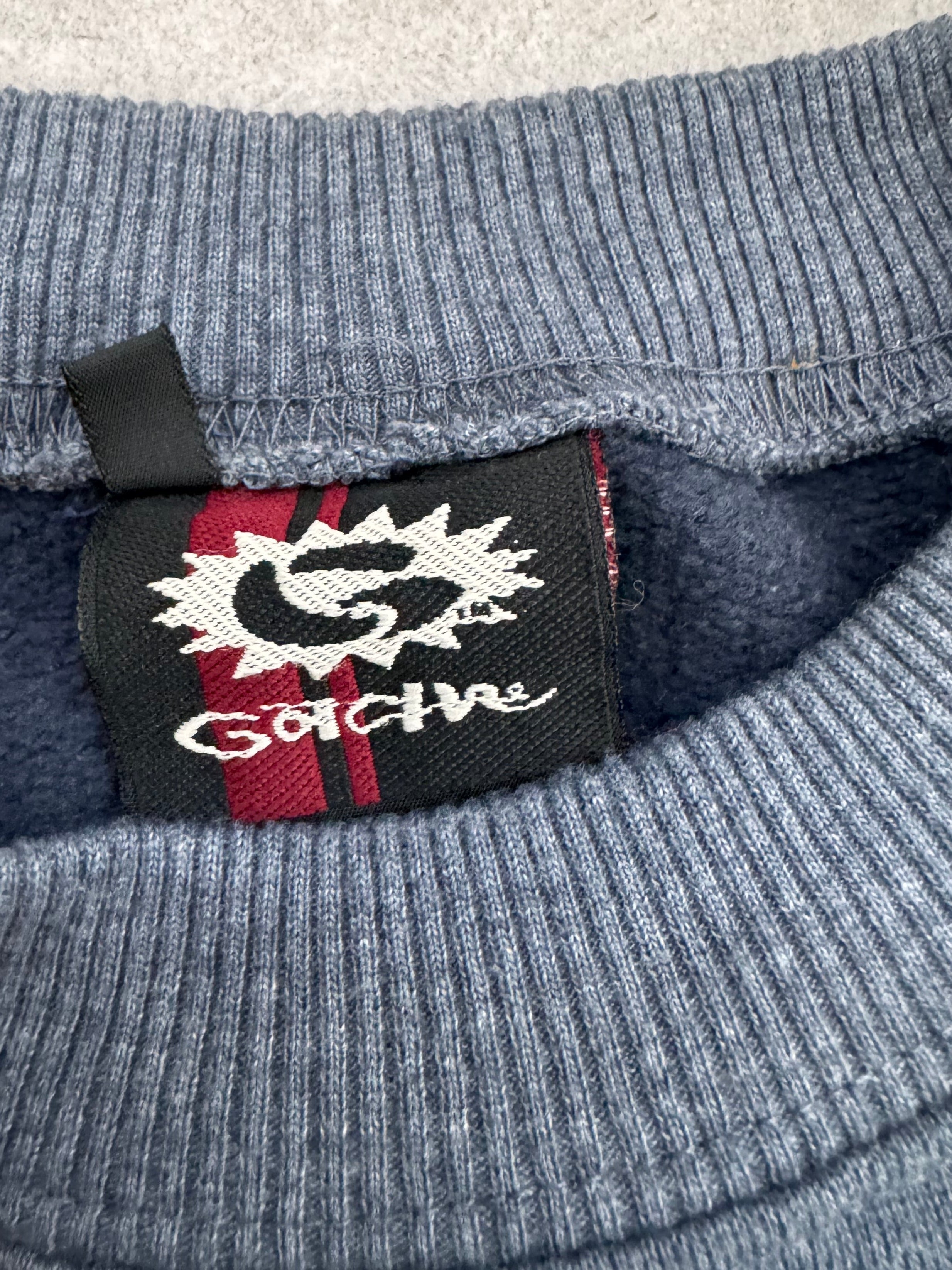 90s Gotcha sweatshirt tag — authentic 1990s vintage surf brand