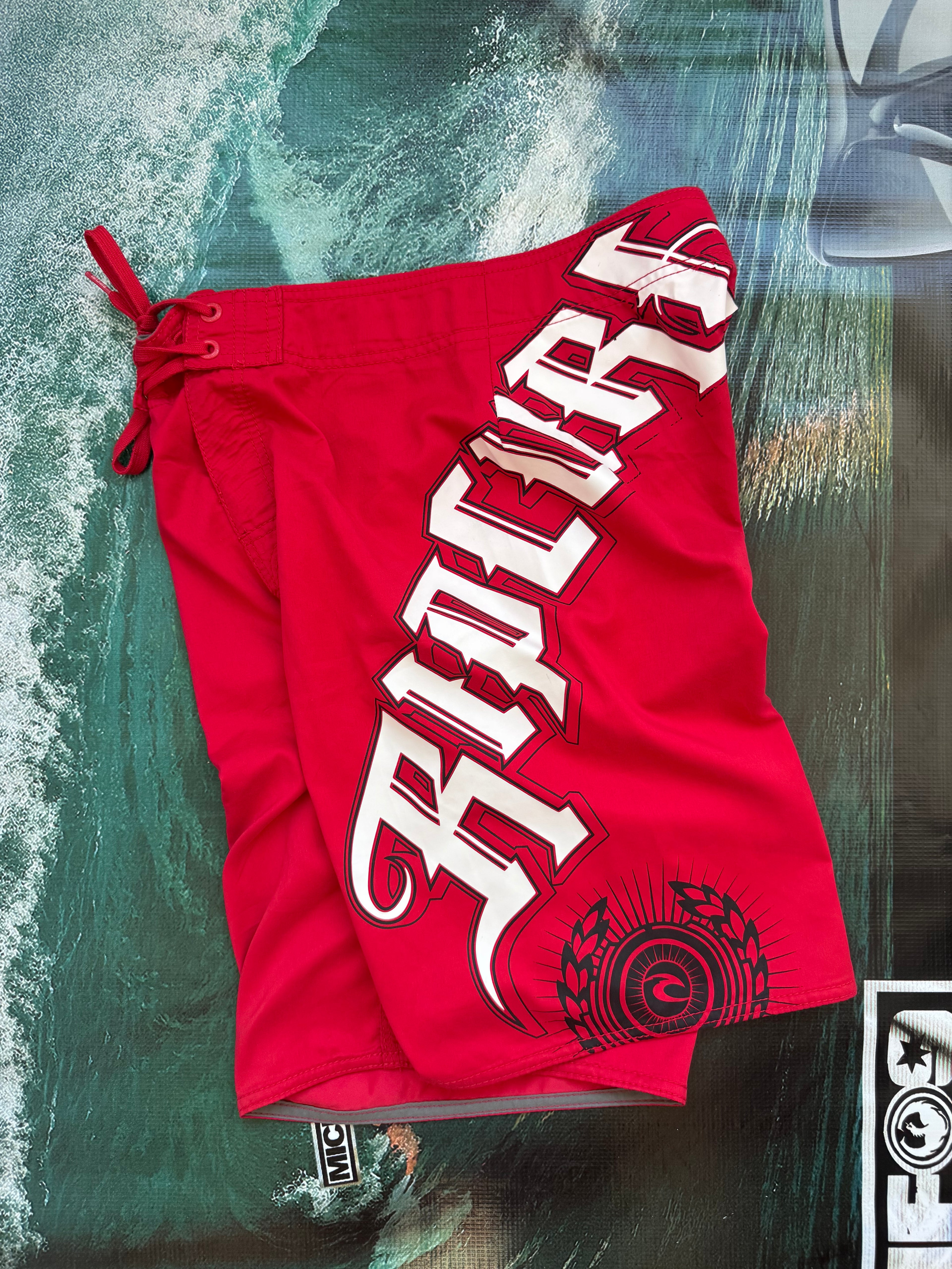 Y2K Rip Curl boardshorts in red, size 28, vintage surf shorts - back view