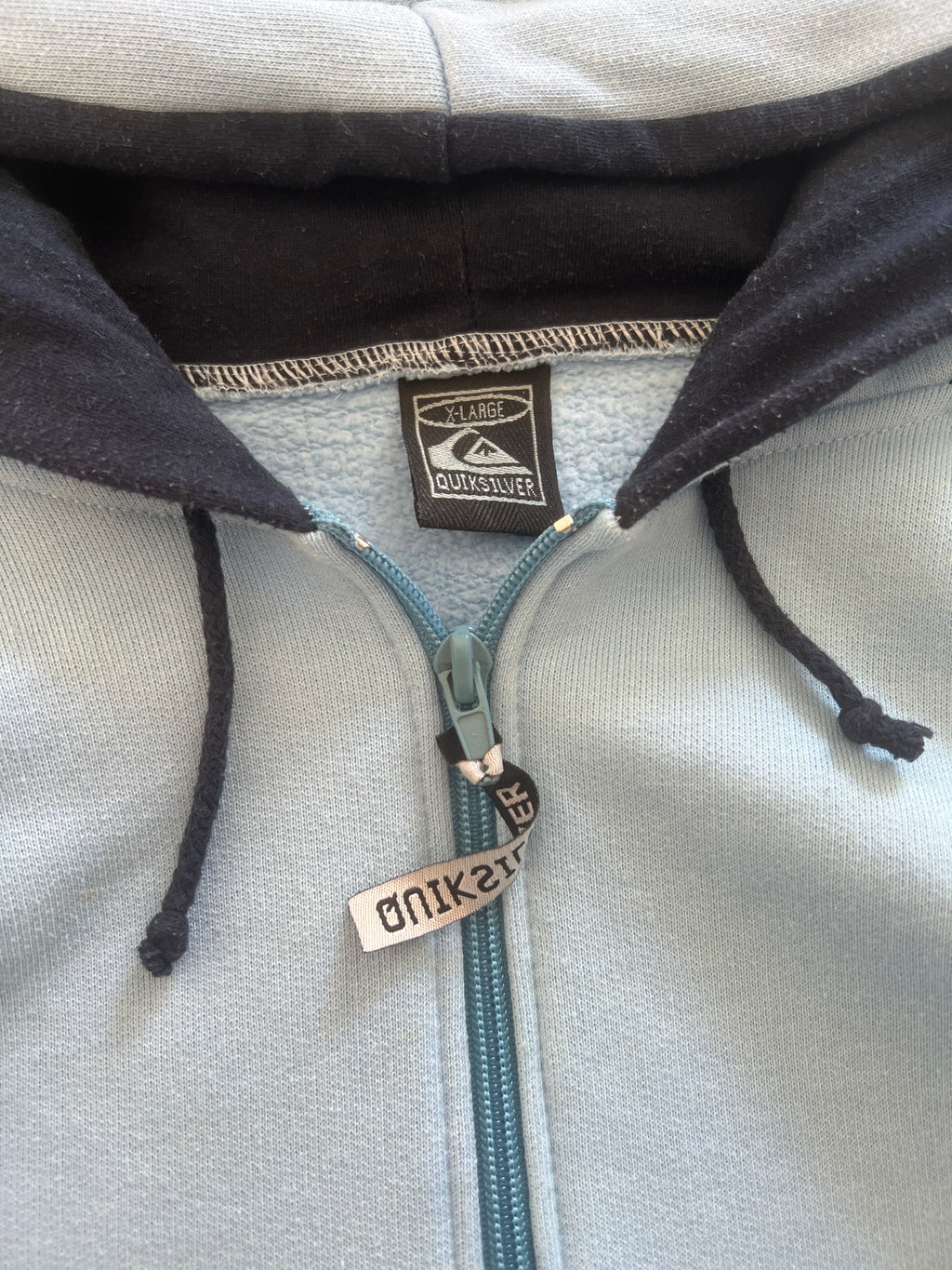 2000s Quiksilver sweatshirt tag — authentic vintage surf brand