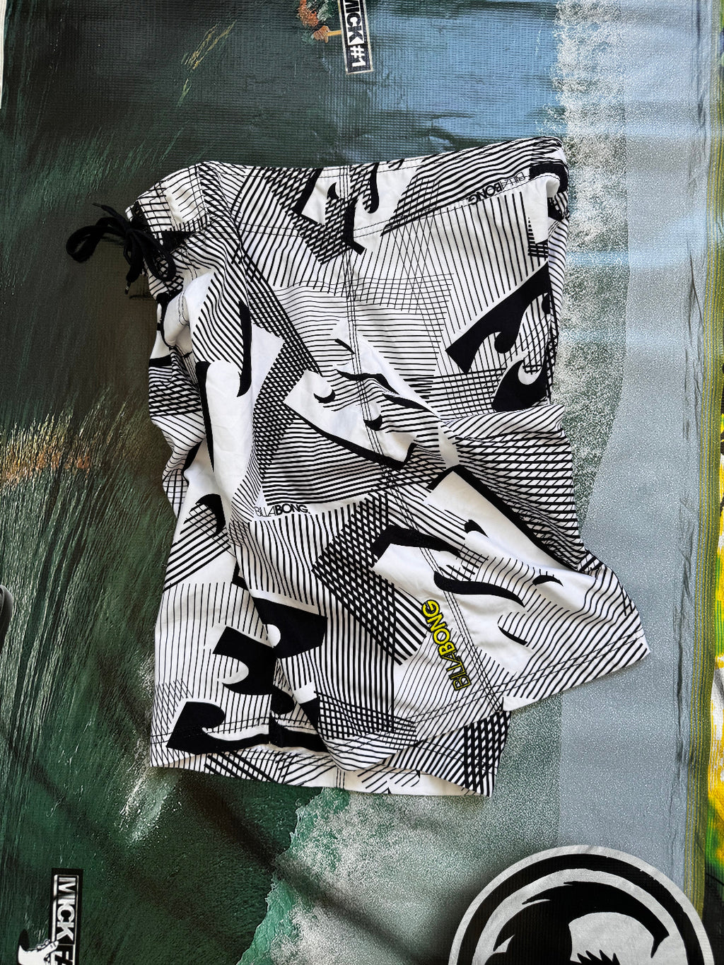 Vintage Y2K Billabong boardshorts in white, grey and black, back view