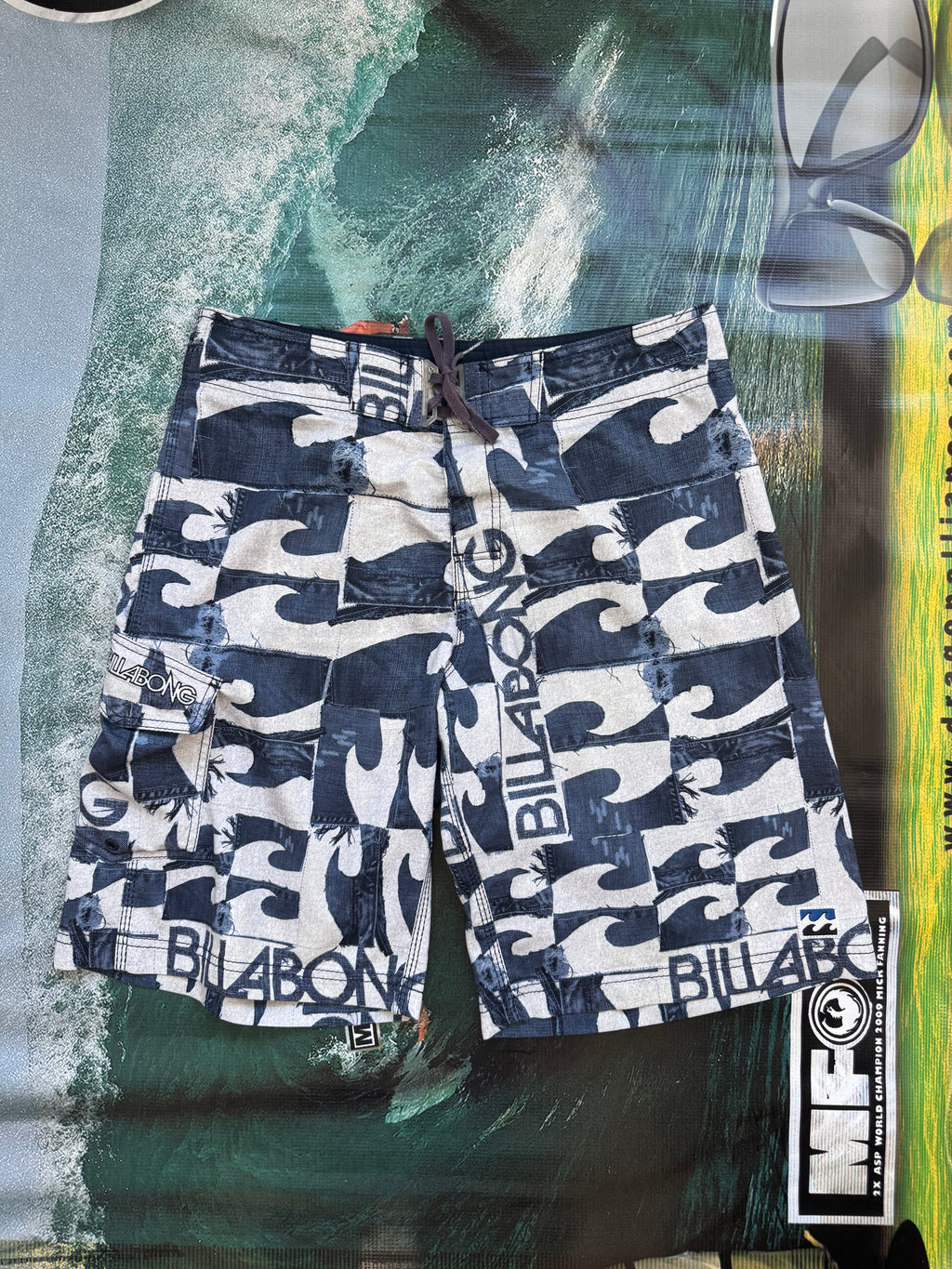 Y2K Billabong denim boardshorts in navy, size 33, deadstock surf shorts - front view