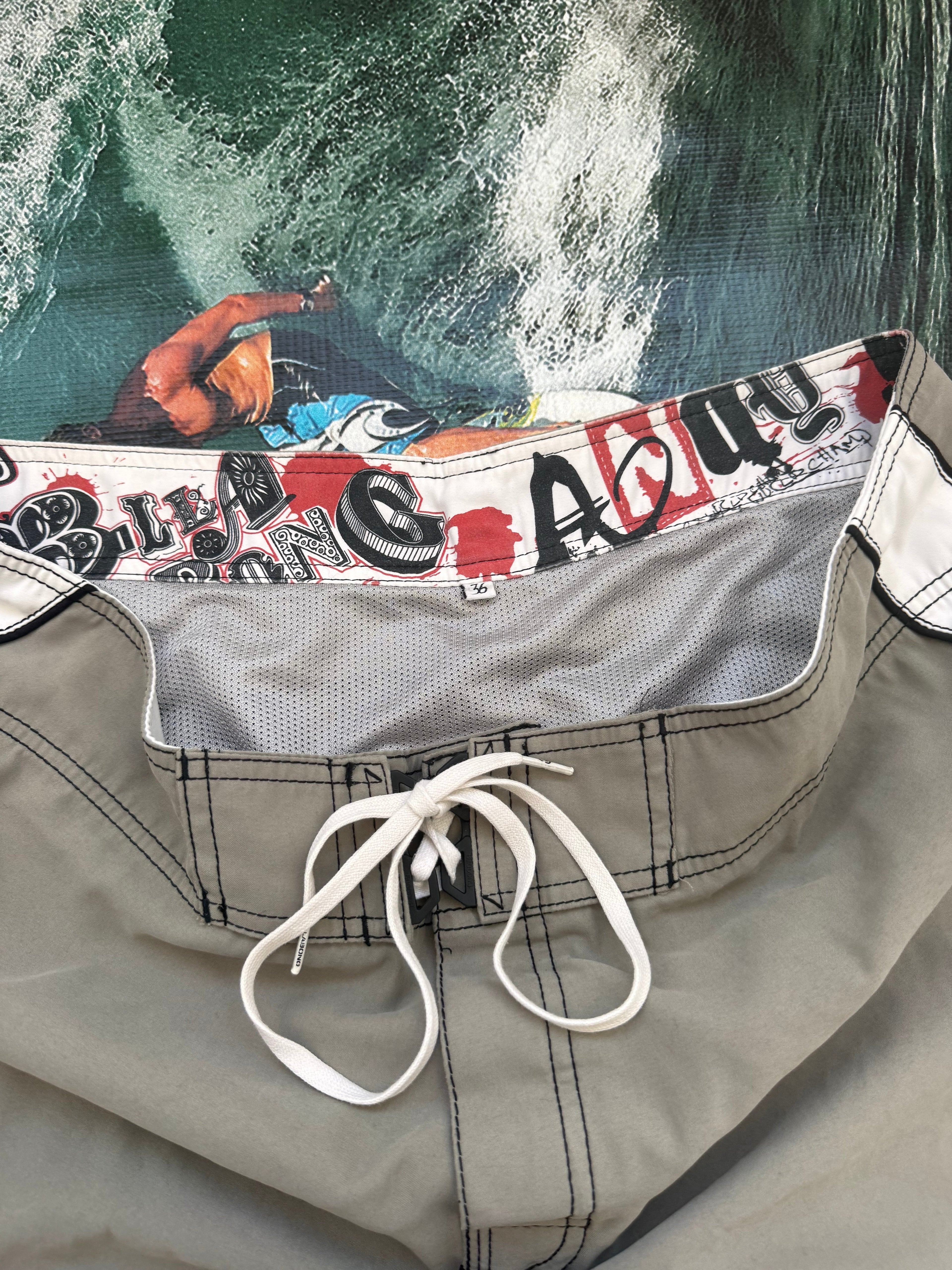 Y2K Billabong Andy Irons signature boardshorts front — authentic vintage surfwear