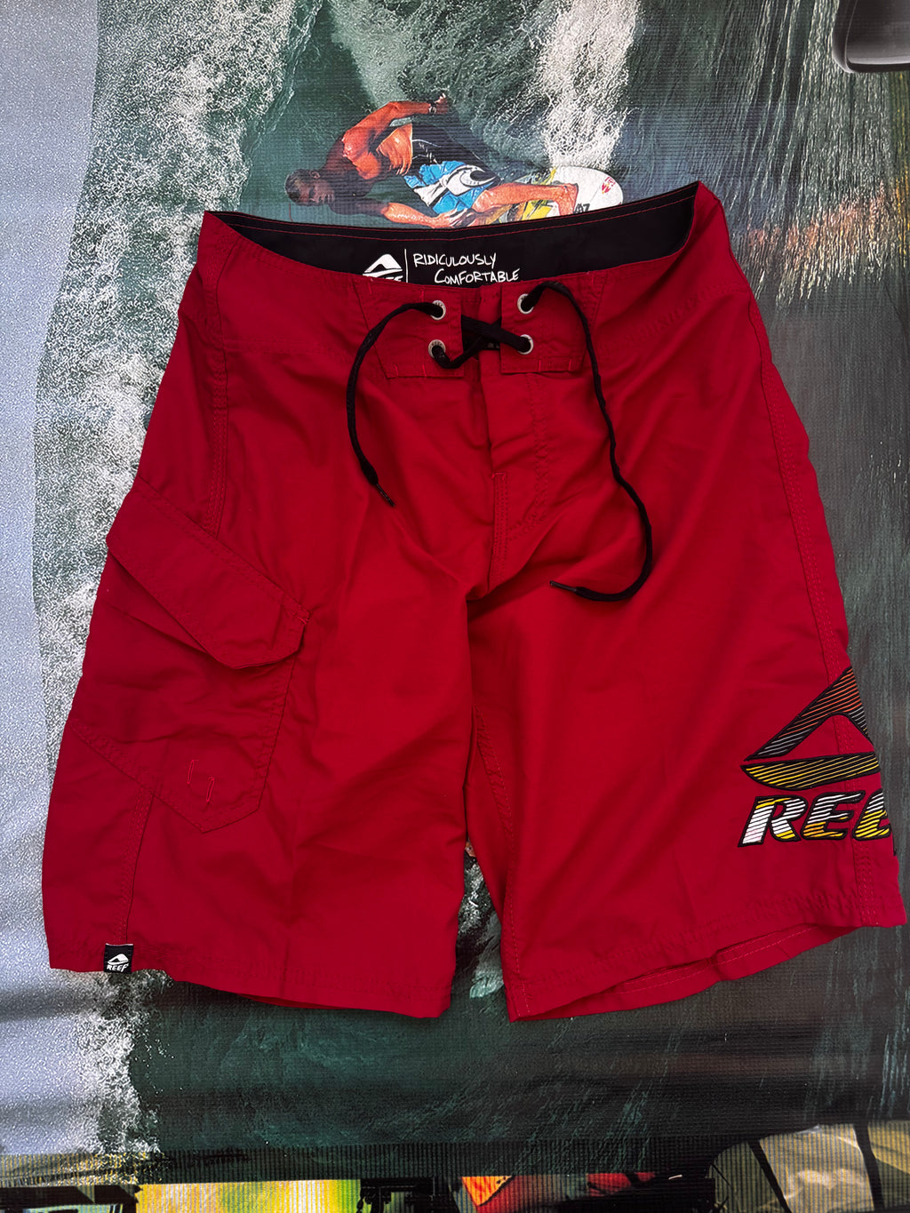 Y2K Reef deadstock boardshorts front — never worn vintage surf boardies