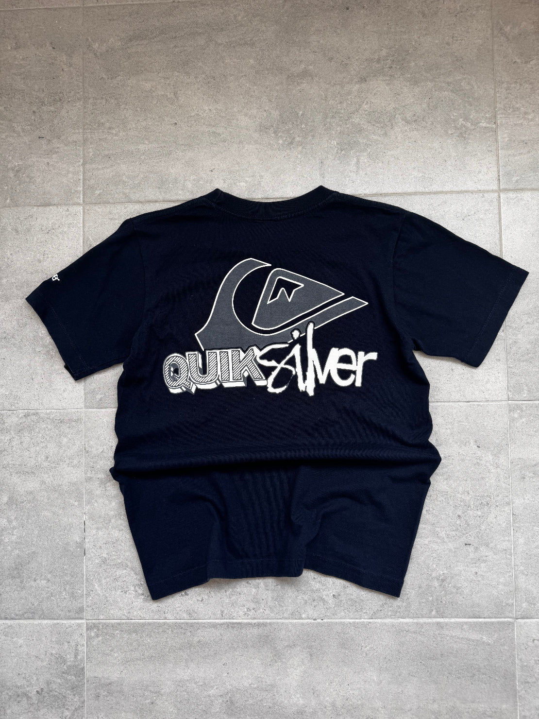 Vintage Y2K Quiksilver T-shirt in navy, back view