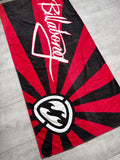 Vintage Y2K Billabong Rising Sun beach towel in red, black and white, full view