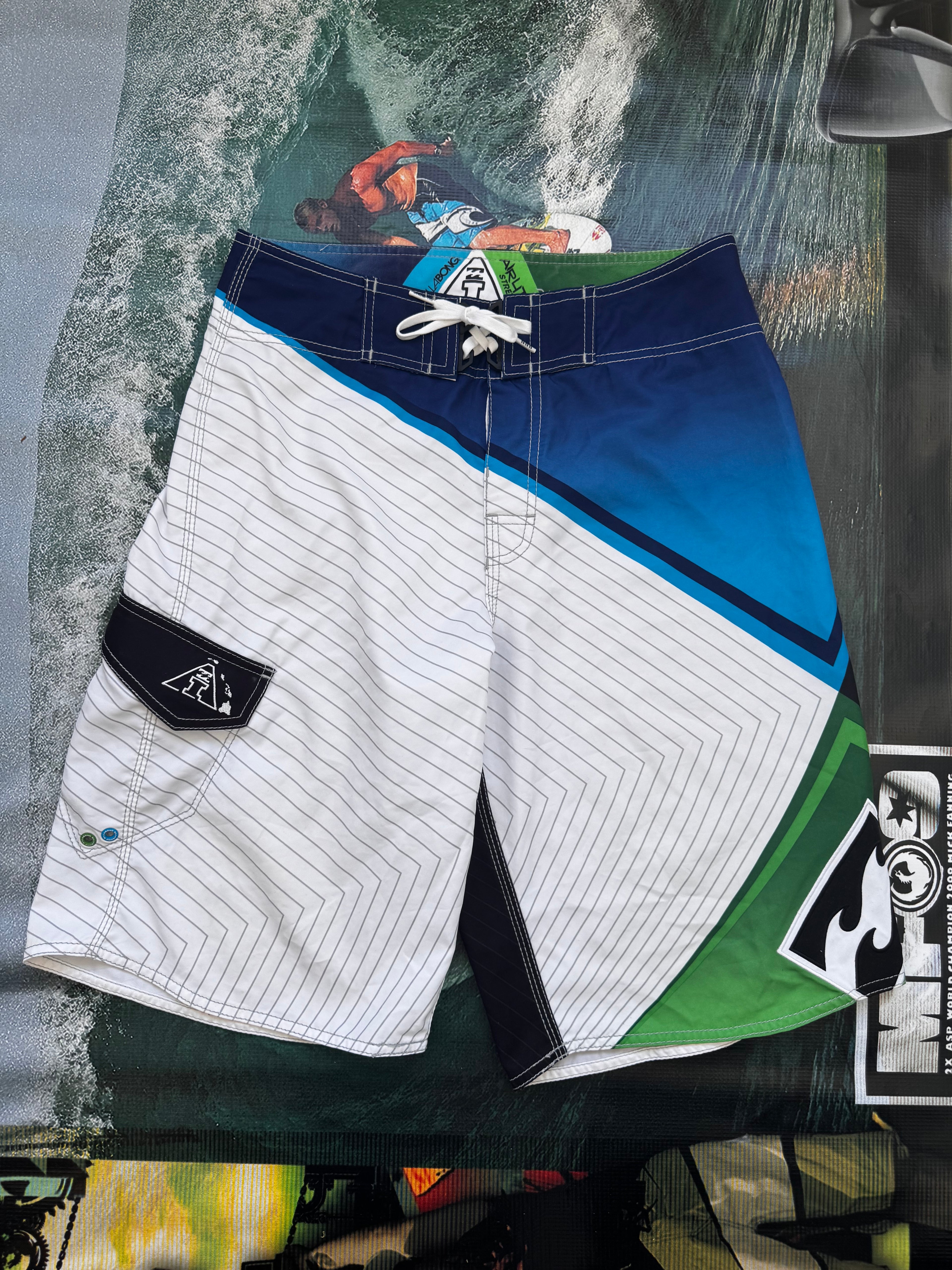 Y2K Billabong Andy Irons boardshorts front logo — authentic vintage surfwear