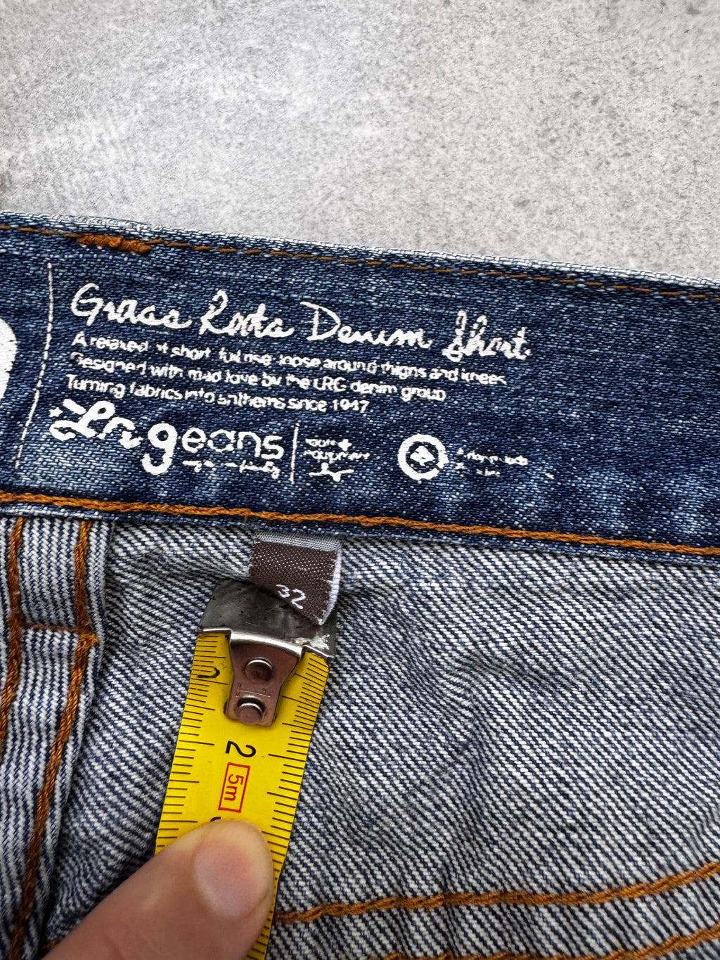 Y2K LRG denim shorts tag — authentic vintage surf skate brand early 2000s