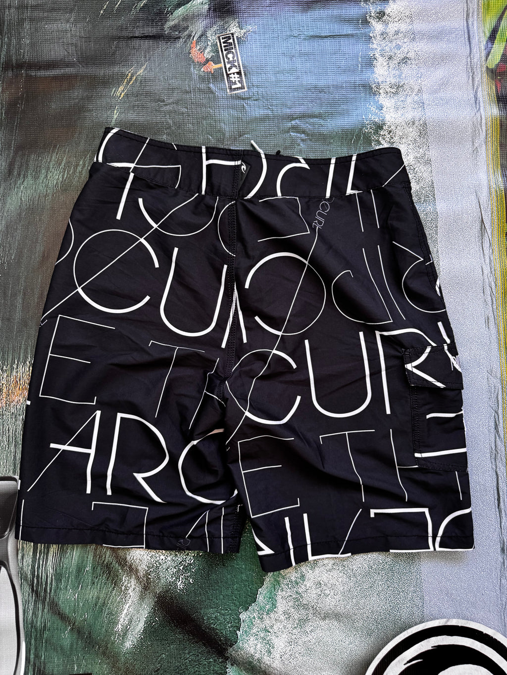 Vintage Y2K Rip Curl boardshorts, logo detail