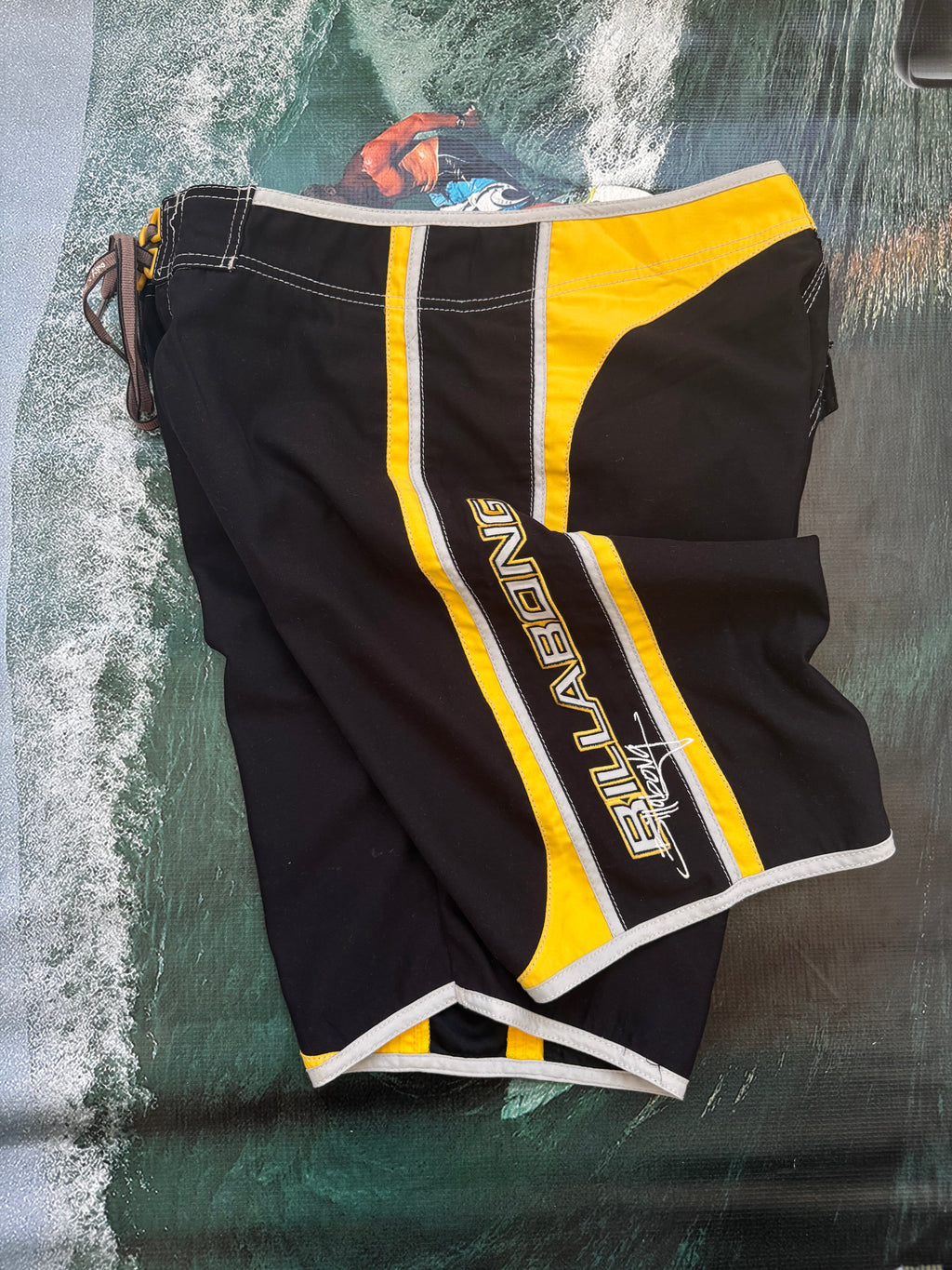 Y2K Billabong boardshorts front graphic — authentic vintage surfwear