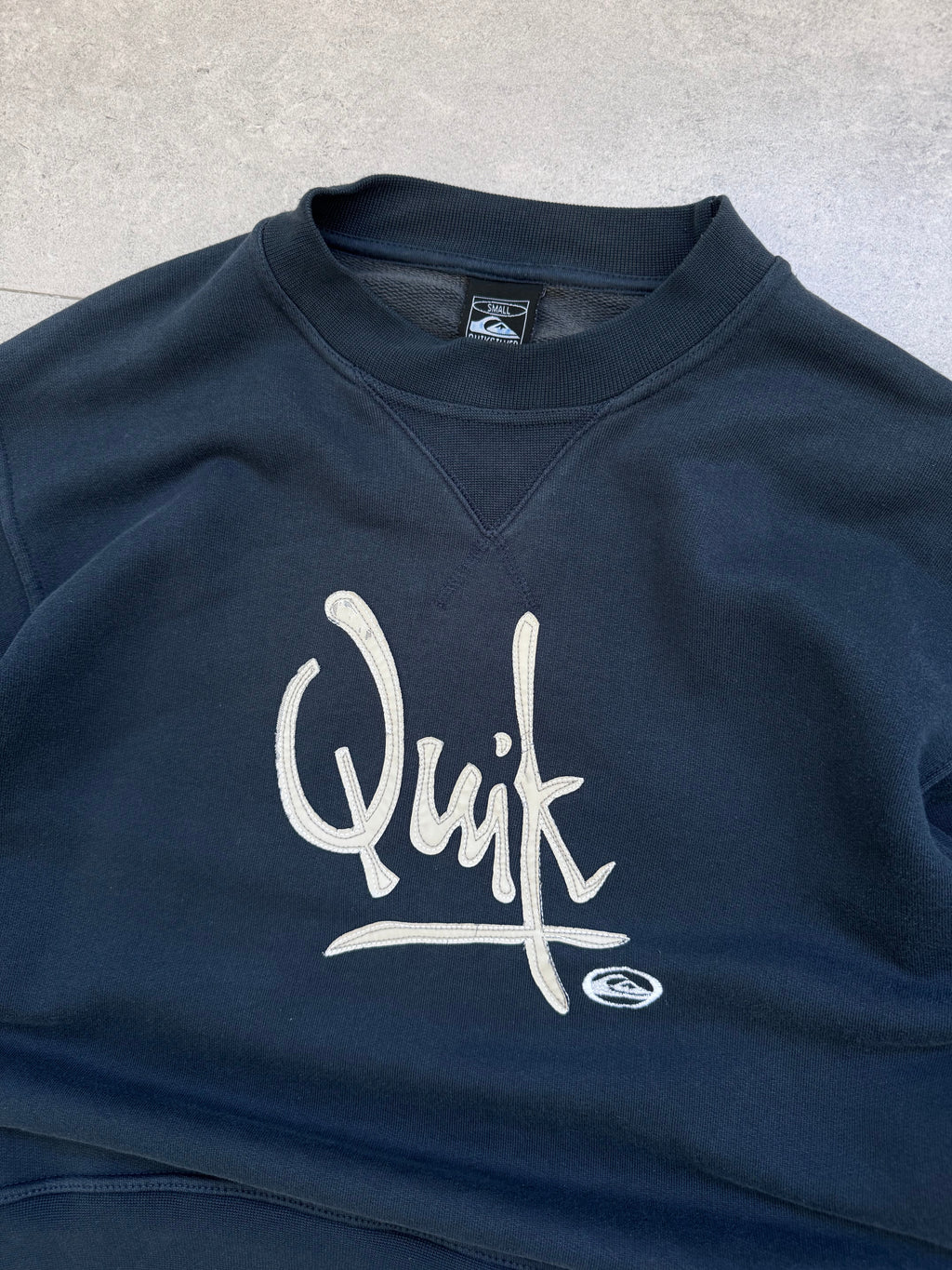 90s Quiksilver vintage crewneck sweatshirt in navy, size S - back view