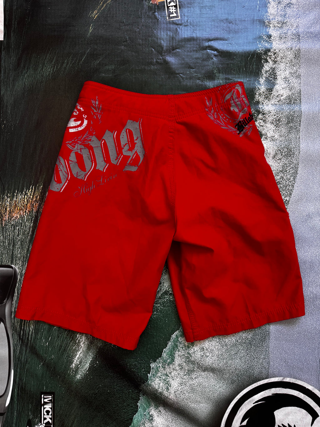 Vintage Y2K Billabong boardshorts in red, logo detail