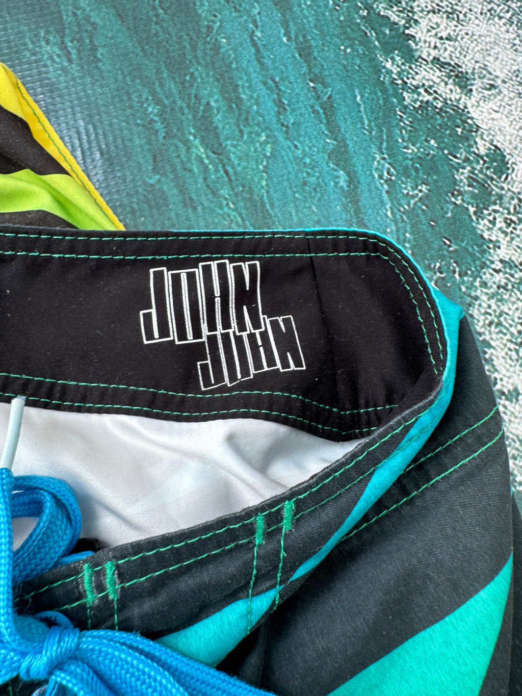 Y2K O'Neill John John Florence boardshorts blue/green/black size 33 – label detail